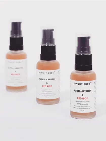 A shot of my Alpha Arbutin & Red Rice serum bottles. Incorporating this into your daily routine is an act of self-care that helps you unwind and feel your best.