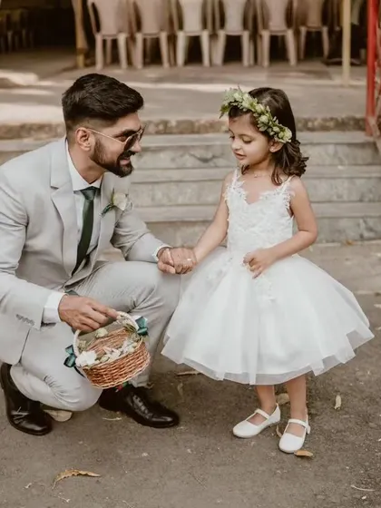 A truly angelic flower girl dress for those unforgettable wedding moments. This white tulle frock is light, airy, and designed for comfort, ensuring she feels as special as the occasion itself.