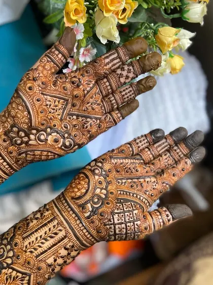 This is a detailed view of my intricate bridal henna work. Each design is unique, combining traditional patterns like paisleys and mandalas with fine-line fillers to create a stunning, full-coverage look for your special day.