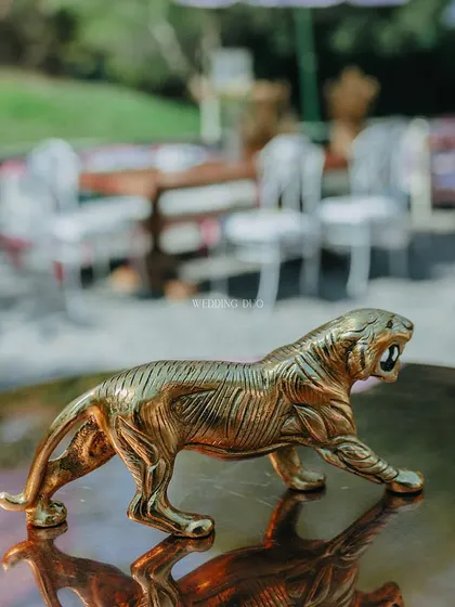 A small, fierce detail. This brass tiger figurine added a touch of wild, royal-inspired charm to a tabletop, reflecting the jungle theme of the celebration.