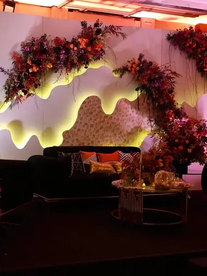 The scale of the custom-fabricated stage and lounge area, designed to be a major focal point of the event.