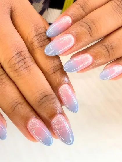 A dreamy pastel ombre design. This set features a soft blend of baby blue and pink with a subtle glittery finish, creating a romantic and ethereal look.