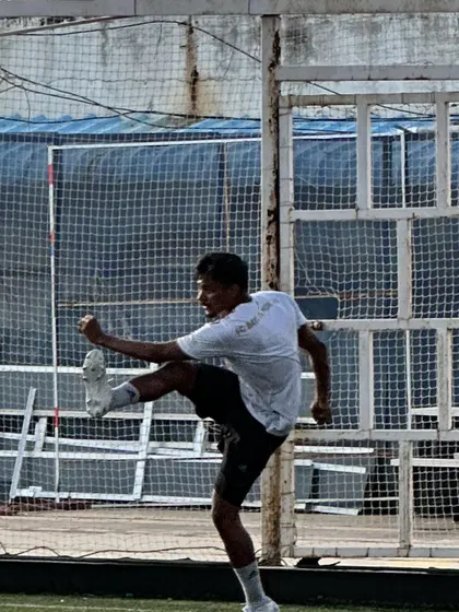 A powerful kick during the game. This is what functional, athletic power looks like in action.