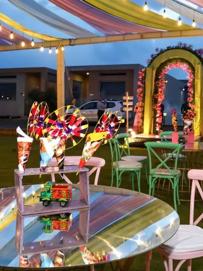 A wide view of the vibrant, multi-colored tent we created for Sonam and Ross's outdoor Sangeet. The flowing drapes and warm lights created a festive and welcoming atmosphere for an evening of dance and music.