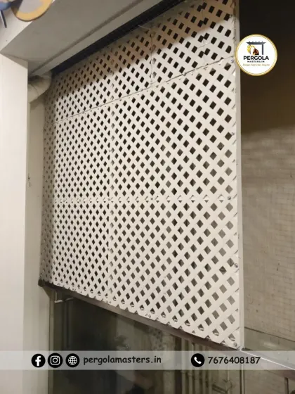 Another view of the white lattice screen installation, showing its clean edges and secure fit within the balcony opening.