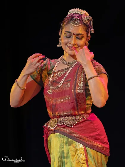 A moment of quiet grace and introspection during a performance.