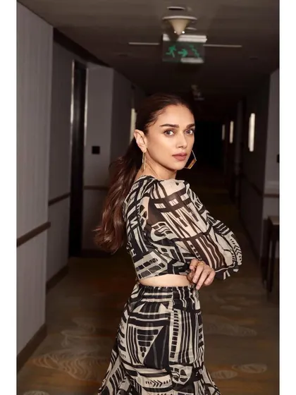 A different angle, showing off the one-shoulder detail and the bold print.