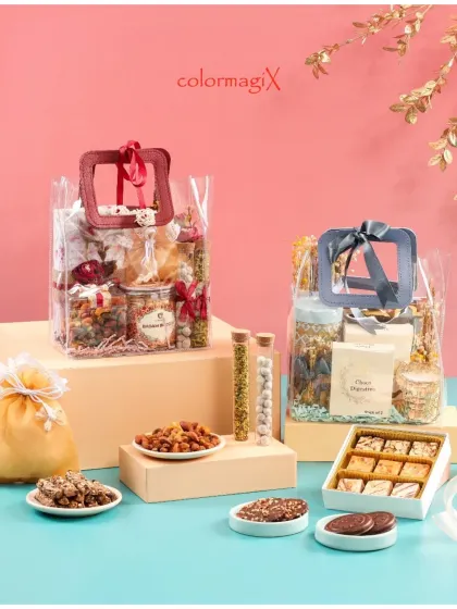 Our modern PVC transparent bags are a stylish and contemporary gifting option. They offer a full view of the curated items inside, including jars, potlis, and sweet boxes.