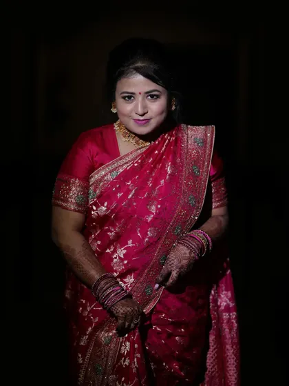 A beautiful engagement makeover for this client. The look is centered around glowing skin and a pretty pink lip, perfectly matching the celebratory mood and her gorgeous red saree.