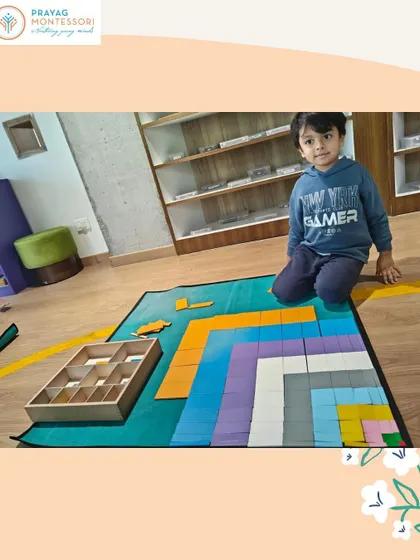 This young learner is exploring the relationships between numbers by assembling the Decanomial Square.