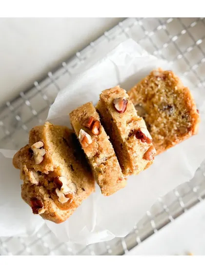 Slices of buttery bliss. Our Pecan Pound cake is moist, buttery, and bursting with nutty flavor. It pairs perfectly with a cup of coffee.