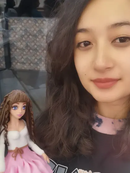 A selfie with my latest creation from the master class. I was so proud of how this detailed fondant doll turned out.