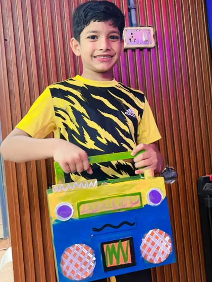 A very cool boombox with a yellow and blue design, ready to play some imaginary tunes.