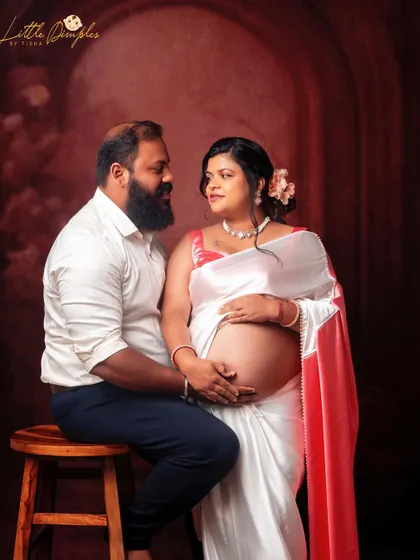 A sweet couple's portrait from a traditional saree session. The love and anticipation they share are beautifully captured in this shot.