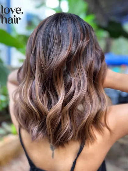 A low-maintenance soft brunette balayage on a chic bob, designed for a seamless grow-out.