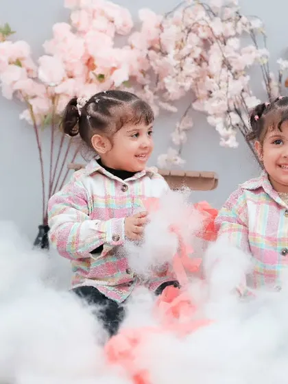 More playtime in the clouds for these adorable twins. Our goal is to make every photoshoot a fun and memorable experience.