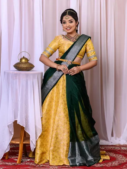 The full view of the half-saree engagement look, showing the complete styling from head to toe.