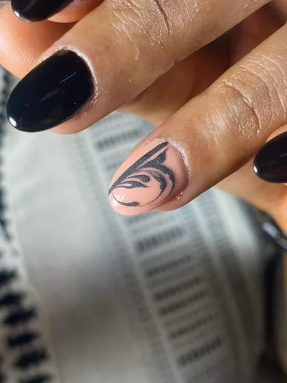 Black in heaven. A close-up of the delicate 3D swirl art before it's applied.