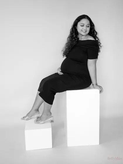 A lovely black and white shot capturing her happy glow. These studio portraits are all about celebrating the joy of the journey.