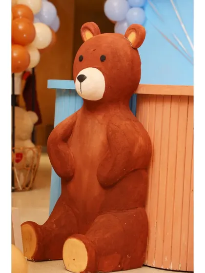 A close-up of the large teddy bear prop used in our themed decorations.