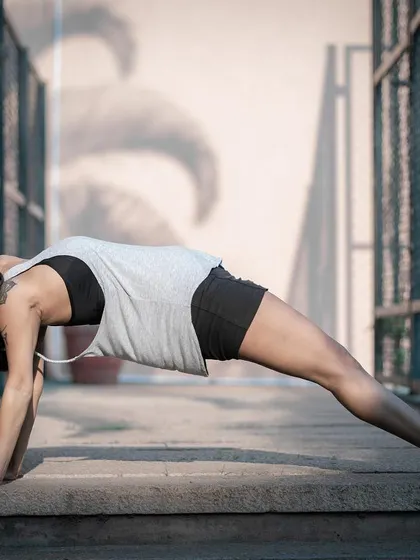 Purvottanasana, or Upward Plank Pose, is an intense stretch for the entire front body. It strengthens the arms, wrists, and legs while opening the heart, making it a perfect pose to start your day.