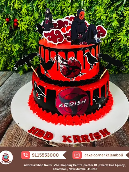 For the anime fans, here's a two-tier Naruto Akatsuki cake. The red and black design with the iconic cloud pattern and characters makes it a truly epic choice for a fan's birthday.