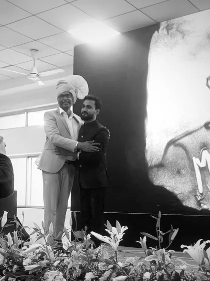 Here I am with Mr. Avinash Chintawar from Bosch in Pune, standing next to the sand art portrait I created for him. It is always a pleasure to connect with leaders and honor their contributions through my art.