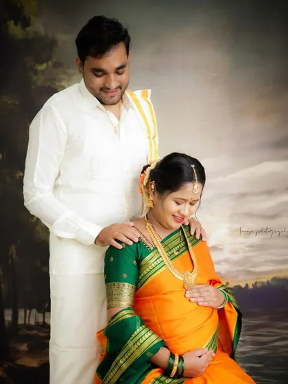 A serene and traditional portrait. This couple, dressed in classic South Indian attire, shares a quiet moment of connection.