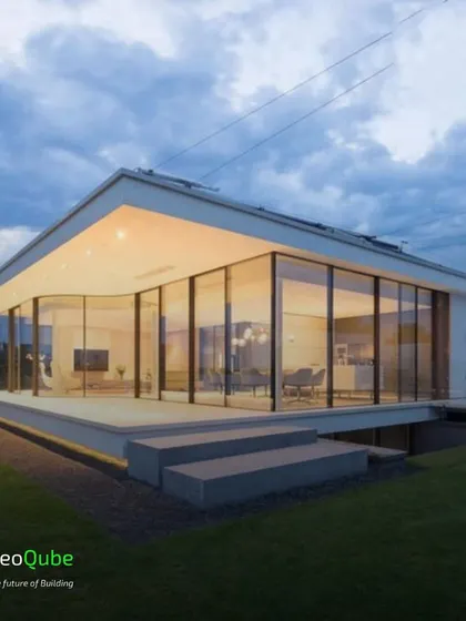 This concept showcases a single-story home with curved glass walls, creating a panoramic view of the outdoors. It demonstrates the flexibility of our building system to create unique architectural forms.