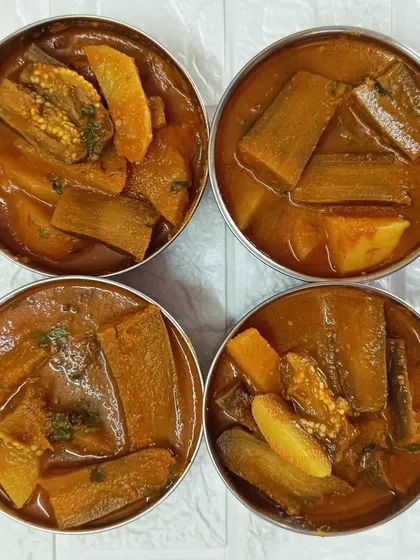 My Aloo Baigan Masala, portioned and ready for tiffin delivery. This humble dish has a rich, homely taste that is pure comfort food.