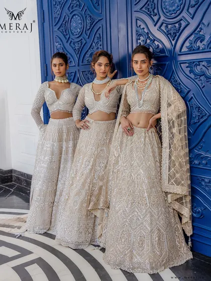 Golden opulence, redefined. These breathtaking ensembles from the 'Ruvaah' collection are adorned with intricate zari work and shimmering sequins.