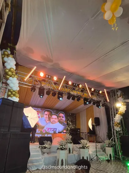 This image captures the scale of the sound and lighting setup. My team and I work to ensure all technical elements are seamlessly integrated into the overall decor for a professional and polished look.