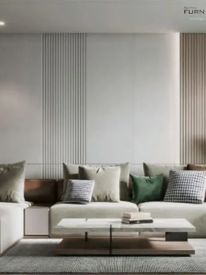 A minimalist living room with a neutral color palette. The design features a simple, comfortable sofa and clean lines, emphasizing a sense of calm and space.