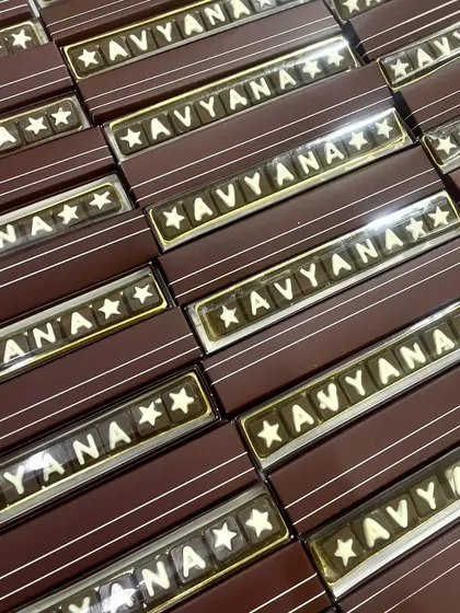 A sweet welcome for little Avyana. We created these custom chocolate bars with her name for her naming ceremony, a memorable favor for guests to take home.