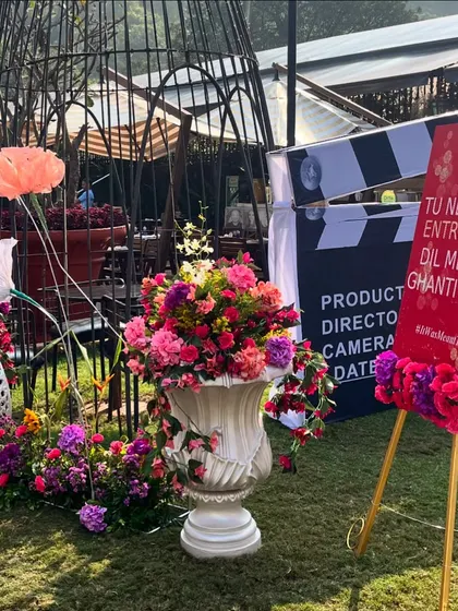 A Bollywood-themed photo op for the Mumbai Fiesta. The clapperboard sign with a funny Hindi movie dialogue is a playful touch that guests loved.