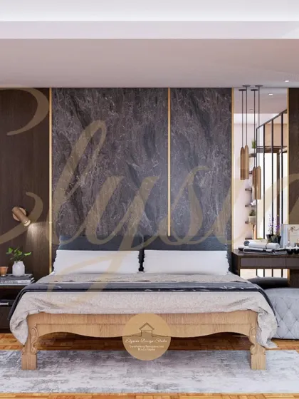 A lavish bedroom design featuring a dark marble-look accent wall with gold inlay. The space is made to feel even more spacious with the use of large, glass-shutter wardrobes that reflect light and add a touch of modern glamour.