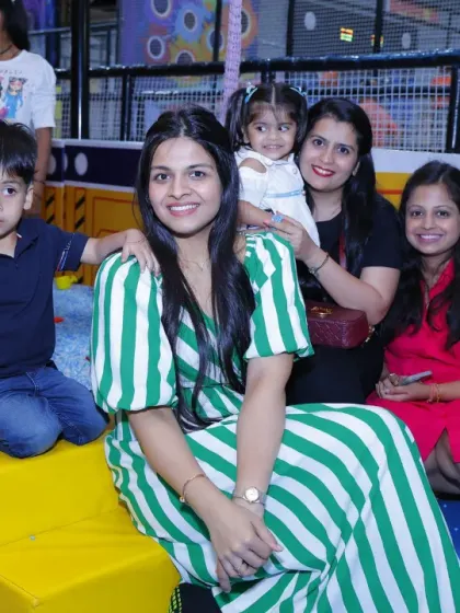 Friends gathered for a fun day out. It's a place where kids play and parents can socialize and connect.