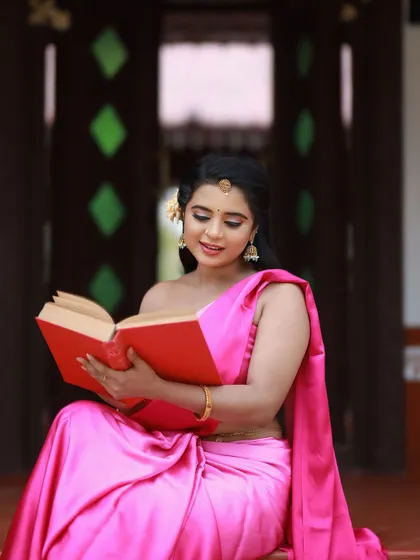 The vibrant pink of this modern saree makes it a joyful and stylish choice for any celebration.