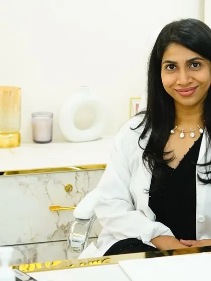 A portrait of Dr. Sahana Ilango at her desk in our new Chennai clinic. She is ready to welcome patients and provide the highest level of dermatological care.