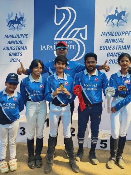 Team REA on the podium at the Japalouppe Annual Equestrian Games. The support and encouragement from the entire team make these victories possible.