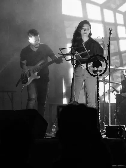 A black and white moment from a live show. Sometimes the quiet moments on a loud stage are the most powerful. Just me, the band, and the music.