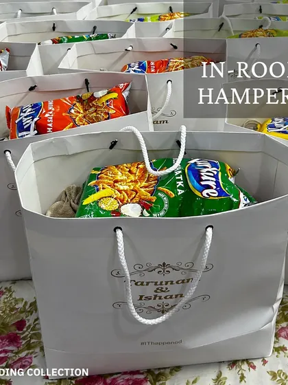 Welcome your out-of-town guests with these personalized in-room hampers. The custom bags are filled with snacks and essentials to make their stay more comfortable.