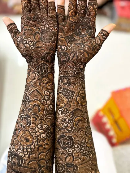 A perfectly symmetrical full-arm design, where every detail on the left arm is mirrored on the right, showcasing my precision and skill.