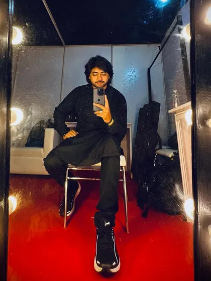 A pre-gig mirror selfie, reflecting on the music to come.