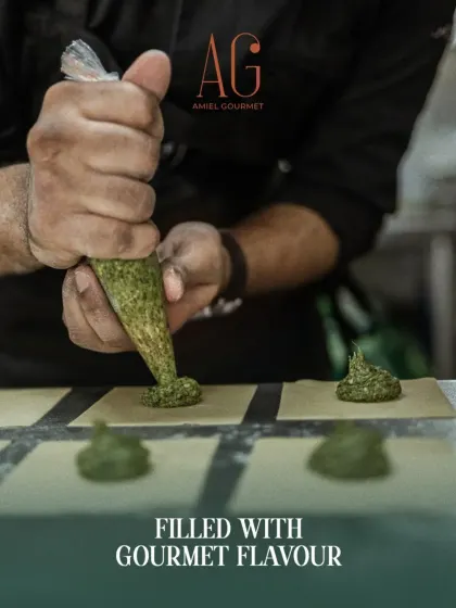 The art of pasta is in the details. I handcraft each tortellini, filling delicate pasta sheets with flavorful, gourmet fillings like this vibrant green pesto, ensuring every bite is authentic and melts in your mouth.