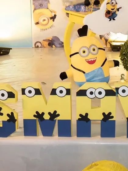 Custom Minion-themed name blocks for Vismaya's birthday. Planning this party virtually for her NRI parents was a wonderful experience, and seeing it all come together was incredibly rewarding.