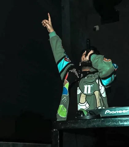 A shot of me reaching for the sky, feeling the peak of the set.