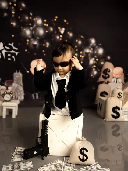 A full shot of the 'Boss Baby' setup, showing the coordinated props and background. I ensure every detail is perfect to bring your chosen theme to life in my studio.
