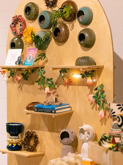 Our student exhibit featured this amazing display of wall planters and other garden accessories. We love seeing how each student brings their own unique style to their creations for plant parents.