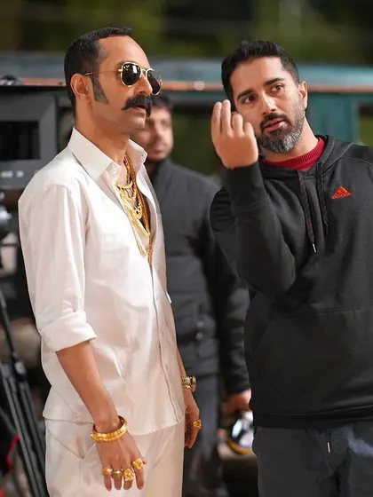On the set of 'Aavesham', I'm breaking down a scene with the incredible Fahadh Faasil. My job is to translate the director's vision into raw, believable action that serves the story. This is where the magic begins.